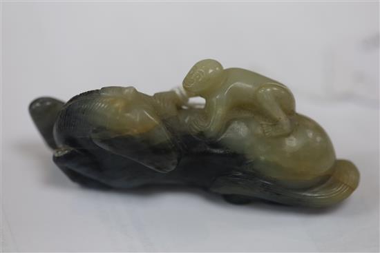 A Chinese pale celadon and grey jade group of a horse with a monkey on its back, 18th / 19th century, L.8.6cm